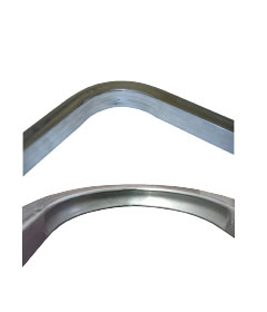 Two soft metal pipe bends are shown, one in aluminum and one in annealed metal.