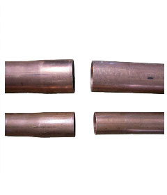 Four pieces of copper show how pipe can be end-formed by Huth machines to fit inside each other.