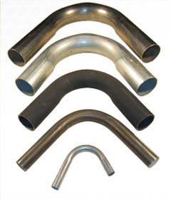 Five examples are shown of bent round tubing that ranges up to 3"" in diameter.