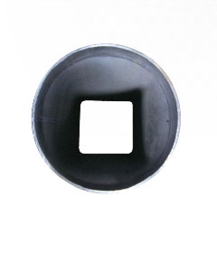 A circular piece of metal has a square-shaped center, showing how it's possible to end-form square to round.