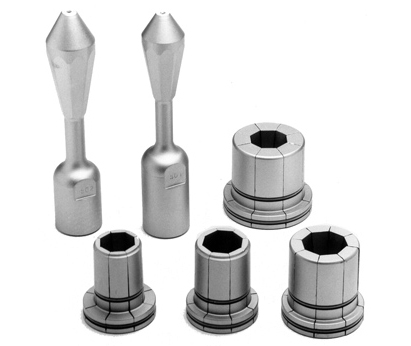 Six silver pieces of tube expansion tooling are shown together against a white background. Two silver-colored arbors are displayed next to four cylindrical segments.