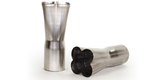 Two aluminized 4-to-1 exhaust collectors are pictured for racecar builders and custom car enthusiasts.