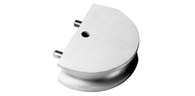 A steel Huth tube bender die is shown against a white background. The full 4"" radius die is half-moon shaped with a small hole in the center.