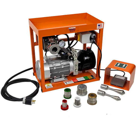 The Huth 1690 Benchtop Tube Expander is a compact machine housed in an orange metal frame. The expander is comprised of silver and black mechanical parts, pictured along with power cords, accessories, and a separate foot petal for easy operation.