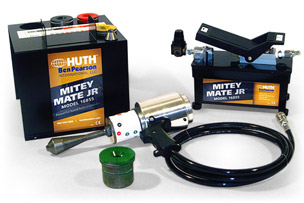 The Huth 1685S Mitey Mate Jr is two small black boxes pictured with power cords and included accessories.